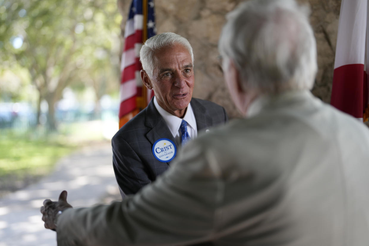 Florida Democratic gubernatorial candidate Charlie Crist greets a supporter at a campaign event in Pinecrest, Fla., Monday, Oct. 17, 2022.(AP Photo/Rebecca Blackwell)