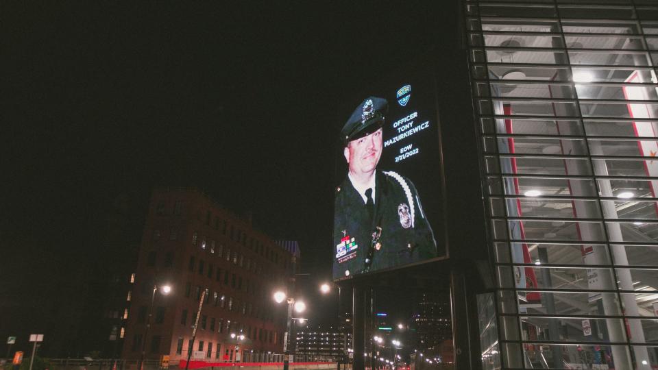 A tribute to officer Tony Mazurkiewicz outside of the Blue Cross Arena.