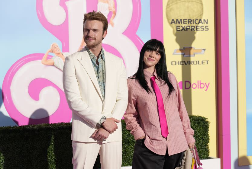 Finneas, left, and Billie Eilish arrive at the pink-carpet premiere of the 'Barbie' movie