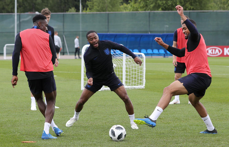 Raheem Sterling joins in a game of keep-ball as the England squad trained in a buoyant atmosphere. (Getty)