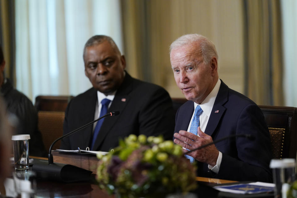 President Joe Biden speaks during a meeting of the White House Competition Council in the State Dining Room of the White House in Washington, Monday, Sept. 26, 2022, as Sec. of Defense Lloyd Austin looks on. (AP Photo/Susan Walsh)