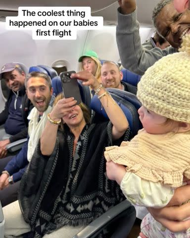 <p>Courtesy of Kelly Levine</p> Meegan Rubin takes photo of hat she knits baby a hat on flight back from Mexico