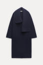 Prix : 39,99 euros au lieu de 71,40 euros<br><br><a href="https://www.zara.com/fr/fr/manteau-a-revers-asymetrique-100%C2%A0-laine-p02893109.html?v1=309258600&v2=2354139" rel="nofollow noopener" target="_blank" data-ylk="slk:Acheter;elm:context_link;itc:0;sec:content-canvas" class="link ">Acheter</a><br><a href="https://www.elle.fr/Mode/Manteau/zara-manteaux-soldes#xtor=AL-541" rel="nofollow noopener" target="_blank" data-ylk="slk:Voir la suite des photos sur ELLE.fr;elm:context_link;itc:0;sec:content-canvas" class="link ">Voir la suite des photos sur ELLE.fr</a><br><h3> A lire aussi </h3><ul><li><a href="https://www.elle.fr/Mode/Les-conseils-mode/Que-faut-il-acheter-pendant-les-soldes#xtor=AL-541" rel="nofollow noopener" target="_blank" data-ylk="slk:Que faut-il acheter pendant les soldes ?;elm:context_link;itc:0;sec:content-canvas" class="link ">Que faut-il acheter pendant les soldes ?</a></li><li><a href="https://www.elle.fr/Mode/Les-conseils-mode/Sur-quelles-pieces-miser-pendant-les-soldes-les-do-et-don-t-4187272#xtor=AL-541" rel="nofollow noopener" target="_blank" data-ylk="slk:Sur quelles pièces miser pendant les soldes : les do et don’t;elm:context_link;itc:0;sec:content-canvas" class="link ">Sur quelles pièces miser pendant les soldes : les do et don’t</a></li><li><a href="https://www.elle.fr/Mode/Les-news-mode/Ou-faire-les-soldes-a-Paris-3744876#xtor=AL-541" rel="nofollow noopener" target="_blank" data-ylk="slk:Où faire les soldes à Paris ?;elm:context_link;itc:0;sec:content-canvas" class="link ">Où faire les soldes à Paris ?</a></li><li><a href="https://www.elle.fr/Mode/Dossiers-mode/Soldes-createur#xtor=AL-541" rel="nofollow noopener" target="_blank" data-ylk="slk:Soldes de créateurs : ces pièces que l’on peut désormais s’offrir;elm:context_link;itc:0;sec:content-canvas" class="link ">Soldes de créateurs : ces pièces que l’on peut désormais s’offrir</a></li><li><a href="https://www.elle.fr/Astro/Horoscope/Quotidien#xtor=AL-541" rel="nofollow noopener" target="_blank" data-ylk="slk:Consultez votre horoscope sur ELLE;elm:context_link;itc:0;sec:content-canvas" class="link ">Consultez votre horoscope sur ELLE</a></li></ul>