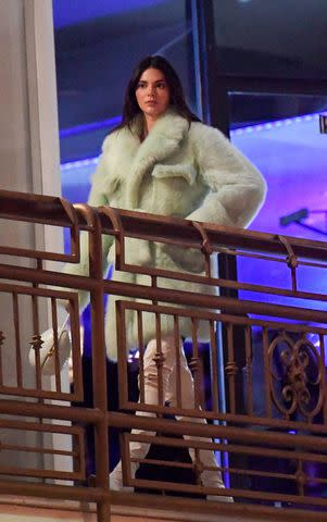 <p>MEGA </p> Kendall Jenner wears mint green coat at West Hollywood's Sushi Park