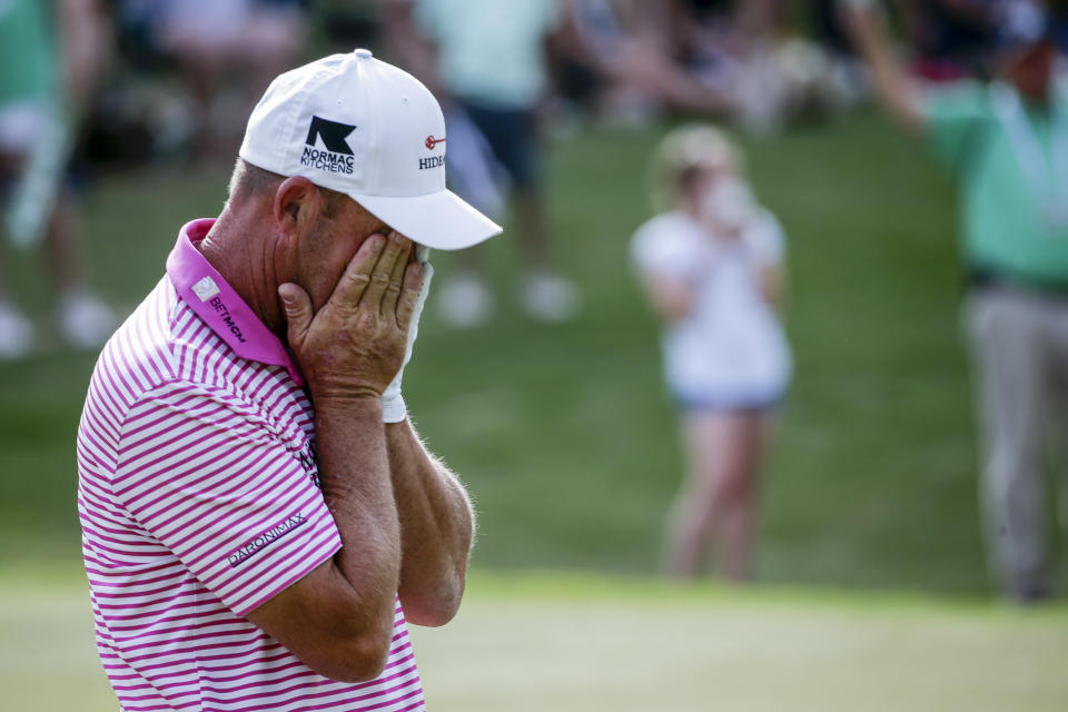 Alex Cejka, of Germany, reacts after Steve Stricker's missed putt in a playoff to win during the final round of the Regions Tradition Champions Tour golf tournament Sunday, May 9, 2021, in Hoover, Ala. (AP Photo/Butch Dill)