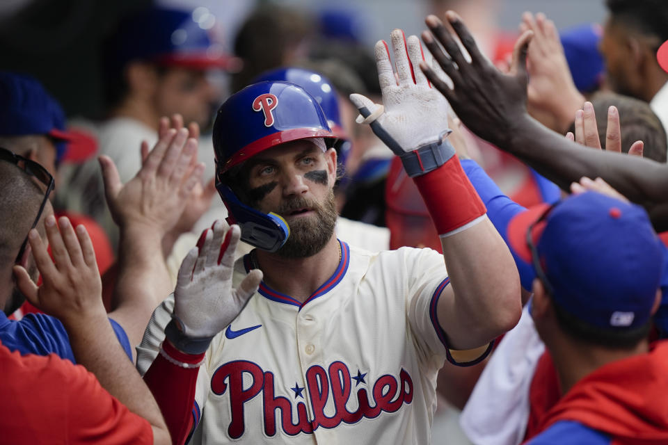 Philadelphia Phillies' Bryce Harper celebrates after his three-run home run off San Francisco Giants pitcher Mason Black during the fifth inning of a baseball game, Monday, May 6, 2024, in Philadelphia. (AP Photo/Matt Rourke)