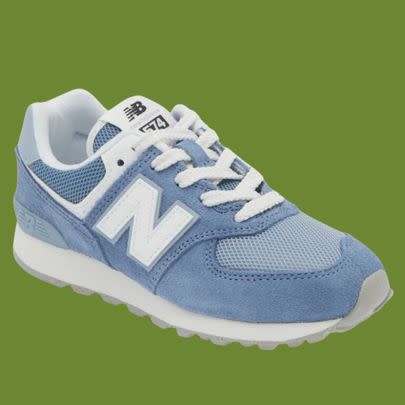 A pair of kid's New Balance 574 sneakers (up to 40% off)