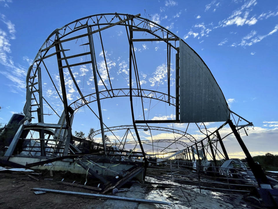 The contorted skeleton of a barn at Wellacrest Farms in Mullica Hill, N.J. A tornado passes passed through the area on Wednesday, Sept. 1, 2021. (Karlie Eachus via AP)