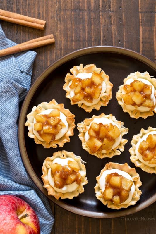 <p>Chocolate Moosey</p><p>Get your apple pie fix in half the time with these no bake apple pie cheesecake phyllo cups. No need to roll out pie dough or spend time baking the cheesecake filling. Just fill pre-made phyllo cups and serve.</p><p><strong>Get the recipe: <a href="https://www.chocolatemoosey.com/2016/10/10/no-bake-apple-pie-cheesecake-phyllo-cups/" rel="nofollow noopener" target="_blank" data-ylk="slk:No Bake Apple Pie Cheesecake Phyllo Cups;elm:context_link;itc:0;sec:content-canvas" class="link "><em>No Bake Apple Pie Cheesecake Phyllo Cups</em></a></strong></p>