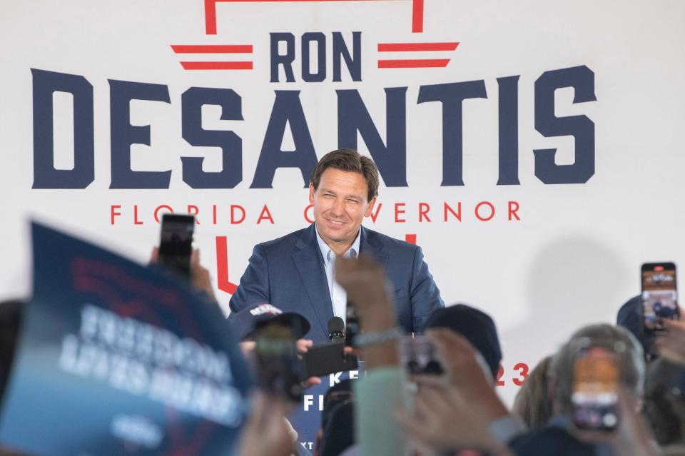 Governor Ron DeSantis speaks to a group of supporters during a campaign stop and rally at the Fish House in Pensacola, Florida, on Tuesday, Nov. 1, 2022. 