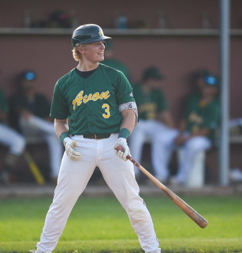 Avon's Peyton Randall smiles before his at-bat Wednesday, July 13, 2022, at Schneider Field in St. Joseph.