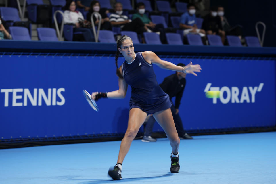 Isabella Shinikova of Bulgaria returns a shot against Karolina Pliskova of the Czech Republic during a singles match in the Pan Pacific Open tennis tournament in Tokyo, Tuesday, Sept. 20, 2022. (AP Photo/Hiro Komae)