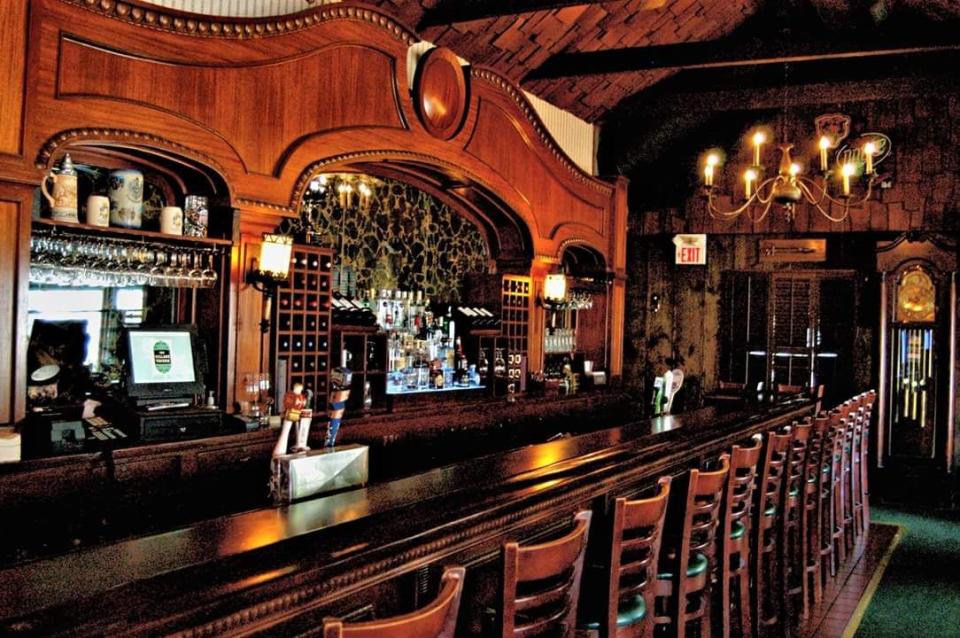 <p>You can't help but belly up to the 35-foot mahogany bar at this <a href="https://www.tripadvisor.com/Restaurant_Review-g36282-d2394984-Reviews-The_Village_Tavern-Long_Grove_Lake_County_Illinois.html" rel="nofollow noopener" target="_blank" data-ylk="slk:Long Grove tavern;elm:context_link;itc:0;sec:content-canvas" class="link ">Long Grove tavern</a>. It's been in operation since 1849, and people still love it for the live entertainment and specials like prime rib and an all-you-can-eat fish fry.</p>