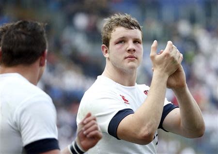 England's Joe Launchbury celebrates after the match against Italy in their Six Nations rugby union match at Olympic Stadium in Rome, March 15, 2014. REUTERS/Tony Gentile