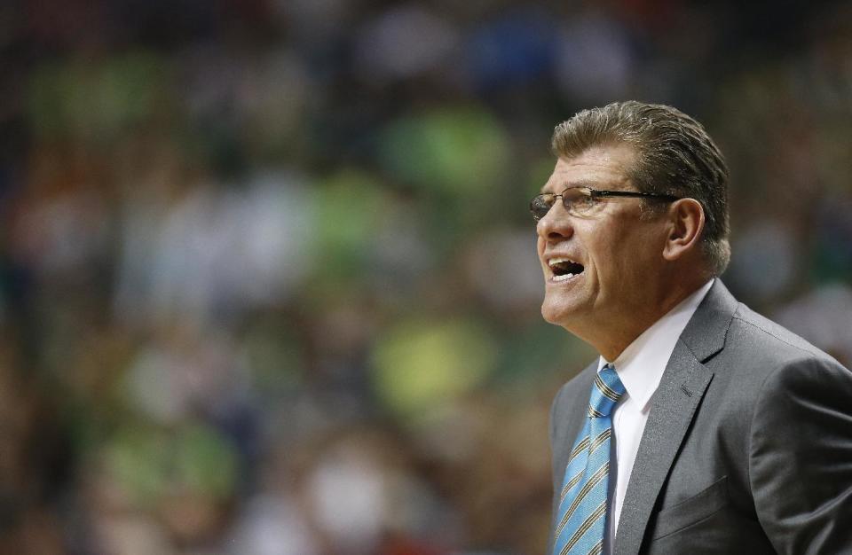 Connecticut head coach Geno Auriemma works against Notre Dame during the first half of the championship game in the Final Four of the NCAA women's college basketball tournament, Tuesday, April 8, 2014, in Nashville, Tenn. (AP Photo/John Bazemore)