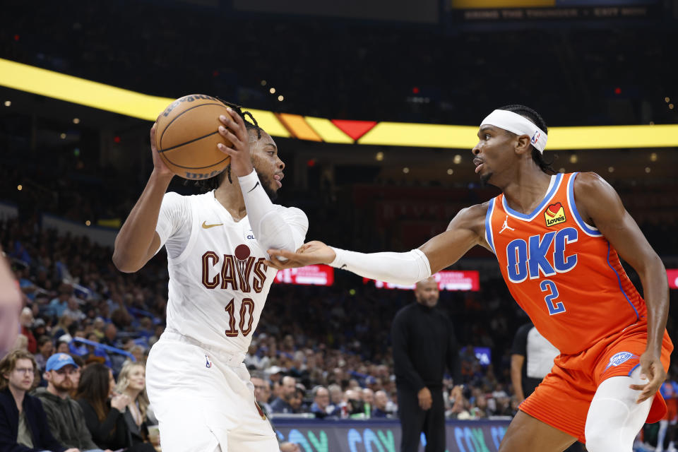 Nov 8, 2023; Oklahoma City, Oklahoma, USA; Oklahoma City Thunder guard Shai Gilgeous-Alexander (2) defends a drive by Cleveland Cavaliers guard <a class="link " href="https://sports.yahoo.com/nba/players/6167" data-i13n="sec:content-canvas;subsec:anchor_text;elm:context_link" data-ylk="slk:Darius Garland;sec:content-canvas;subsec:anchor_text;elm:context_link;itc:0">Darius Garland</a> (10) during the second quarter at Paycom Center. Mandatory Credit: Alonzo Adams-USA TODAY Sports