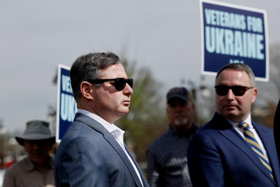 Eugene Vindman, left, and his brother Alexander, right, were central figures in the 2020 impeachment of Donald Trump. Eugene Vindman is now a candidate for Congress in Virginia (Getty Images)