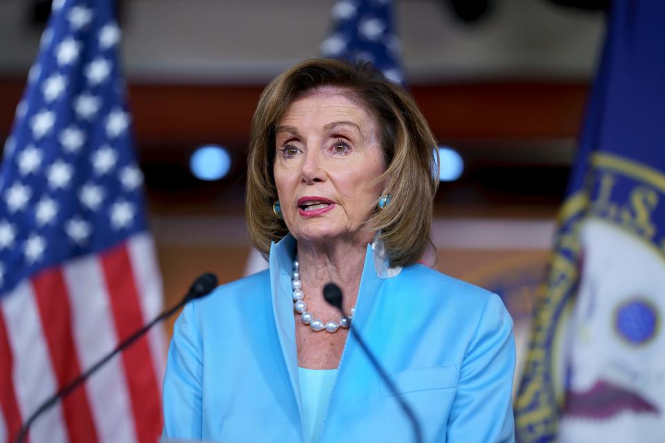 In this Aug. 6, 2021, file photo Speaker of the House Nancy Pelosi, D-Calif., meets with reporters at the Capitol in Washington. Moderate House Democrats say they'll sink a crucial fiscal blueprint outlining $3.5 trillion in social and environment spending unless a separate infrastructure bill is approved first. Nine of them have written Pelosi saying they "will not consider voting" for the budget resolution unless the separate, $1 trillion infrastructure measure is first enacted into law.