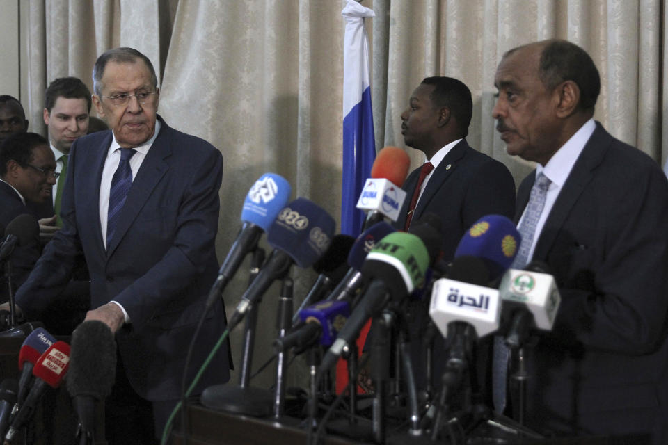 Russian Foreign Minister Sergei Lavrov, left, and Sudanese acting foreign minister Ali al-Sadiq give a joint press conference at the airport in Khartoum, Sudan, Thursday, Feb. 9, 2023. (AP Photo/Marwan Ali)