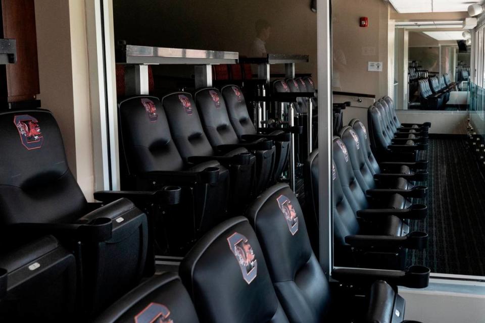 One of 18 suites at Williams-Brice Stadium. Glass partitions separate the suites. The waiting list for a suite is more than 120 people long. One has not come available since 2016.