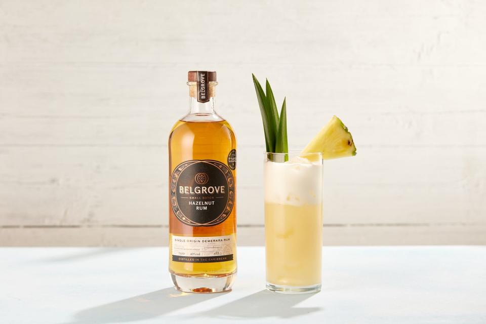 <p>Belgrove make a sensational hazelnut rum that we can't get enough of and adding it into a Piña Colada is genius. Nutty, sweet and tangy - what more could you want from a cocktail?</p><p><strong>You'll need:</strong></p><ul><li>40ml Belgrove Hazelnut Rum</li><li>60ml coconut cream (we recommend Coco Lopez)</li><li>120ml pineapple juice</li><li>10ml lime juice</li><li>Garnish: wedge of fresh pineapple and pineapple leaves</li></ul><p><strong>Method:</strong></p><ol><li>Combine the Belgrove Hazelnut Rum, coconut cream, pineapple juice & lime juice in a shaker with ice, and shake for 10 seconds.</li><li> Strain into a Collins glass filled with ice, and garnish with a wedge of fresh pineapple & pineapple leaves.</li></ol>