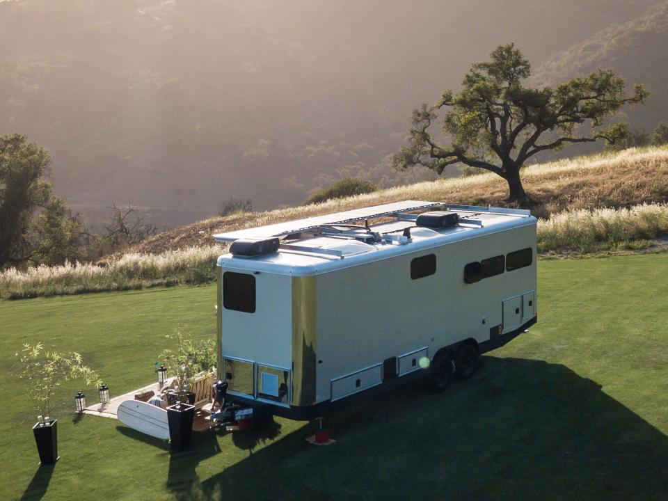 the 2022 Living Vehicle trailer outside on a patch of grass