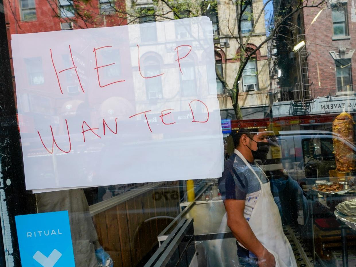 A help wanted sign in a New York City restaurant