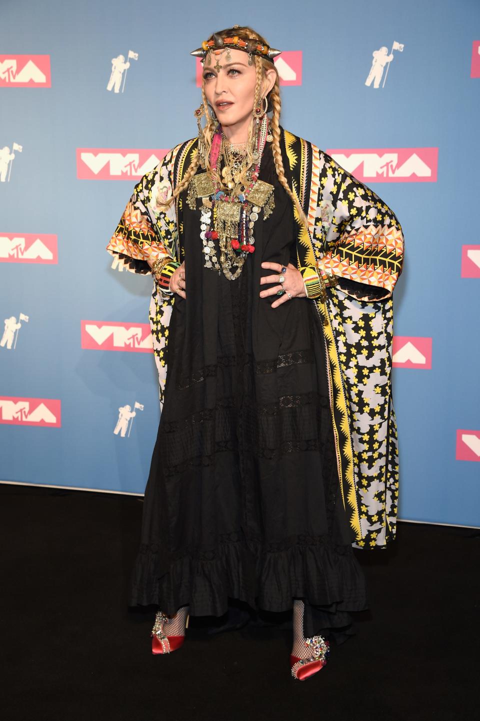 Madonna poses backstage during the 2018 MTV Video Music Awards.