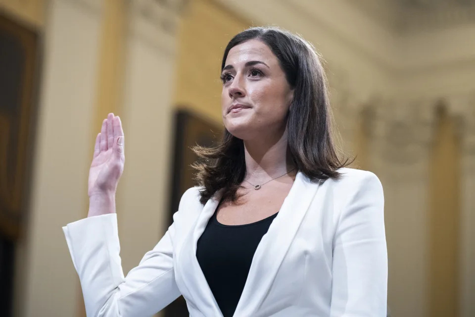 Cassidy Hutchinson raises her right hand to take the oath.