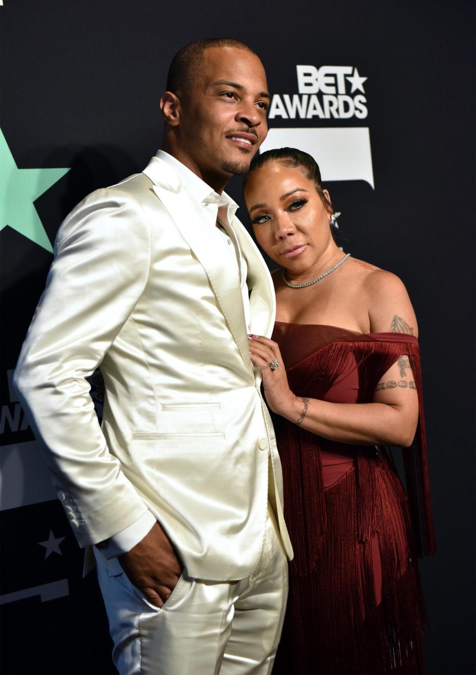 T.I. and Tameka "Tiny" Harris backstage at the BET Awards in Los Angeles