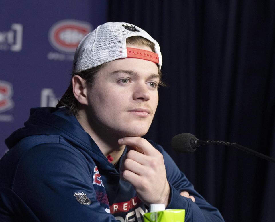 Montreal Canadiens NHL hockey forward Cole Caufield speaks to the media about his season-ending shoulder injury Friday, Jan. 27, 2023, in Montreal. (Ryan Remiorz/The Canadian Press via AP)