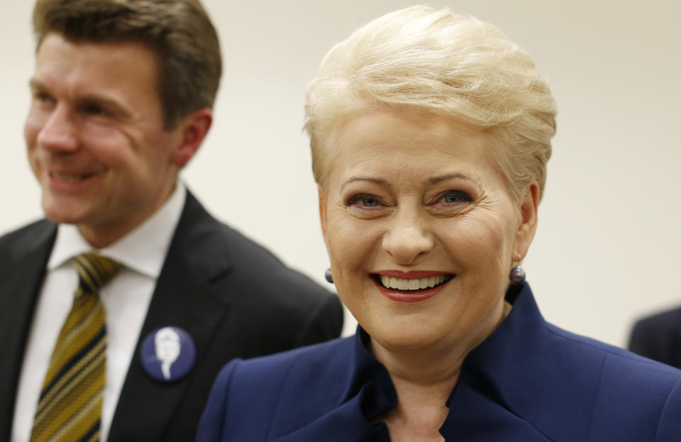 Lithuania's President Dalia Grybauskaite smiles in a office as she waits for the results of Lithuania's presidential election first round in Vilnius, Lithuania, Sunday, May 11, 2014. Dalia Grybauskaite is widely expected to be re-elected for a second term. (AP Photo/Mindaugas Kulbis)