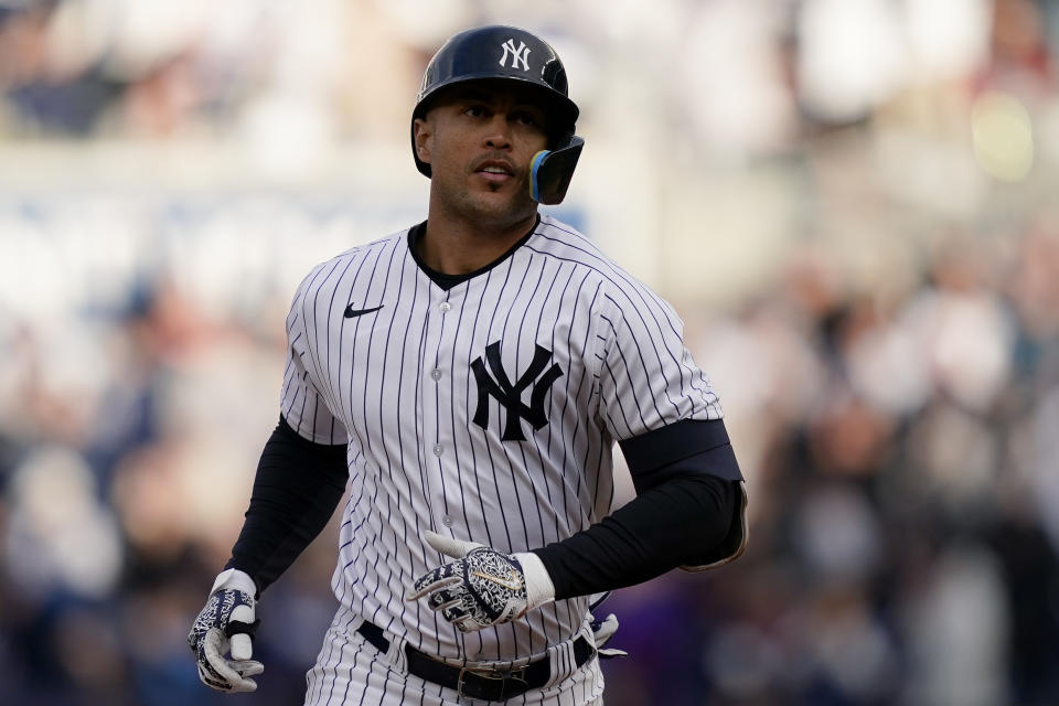 New York Yankees' Giancarlo Stanton runs the bases after hitting a two-run home run off Boston Red Sox starting pitcher Nick Pivetta in the sixth inning of a baseball game, Saturday, April 9, 2022, in New York. (AP Photo/John Minchillo)