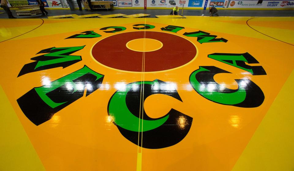 53. Designed for $27,500 by New York pop artist Robert Indiana, the MECCA floor was a controversial addition in 1977. The Milwaukee Exposition and Convention Center served as home to the Milwaukee Bucks and Marquette men’s basketball team.