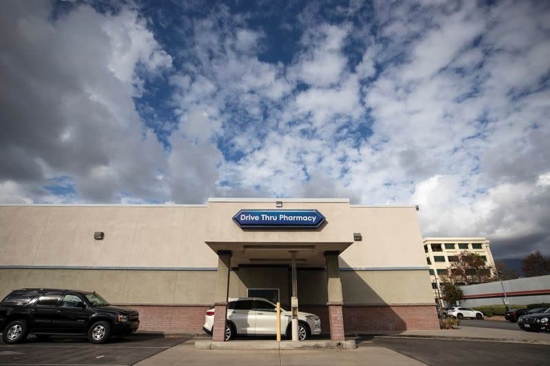 Vehicles line up at a self-swabbing coronavirus disease (COVID-19) test at a Rite Aid drive-thru during the outbreak of COVID-19, in Pasadena