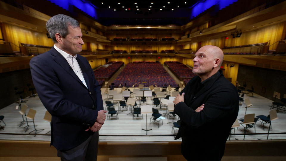 New York Philharmonic music director Jaap van Zweden (right) with correspondent David Pogue at the newly-redesigned David Geffen Hall at Lincoln Center.  / Credit: CBS News