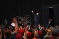 <p>President Donald Trump leaves the stage following a rally on June 21, 2017 in Cedar Rapids, Iowa. Trump spoke about renegotiating NAFTA and building a border wall that would produce solar power during the rally. (Photo: Scott Olson/Getty Images) </p>