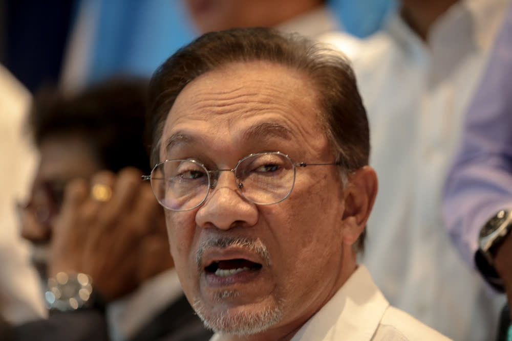 Datuk Seri Anwar Ibrahim urged the police to investigate an author who allegedly blackmailed him. — Picture by Ahmad Zamzahuri