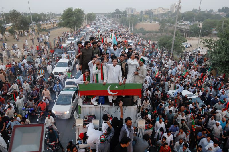 Ousted Pakistani Prime Minister Imran Khan gestures as he leads a protest march in Islamabad