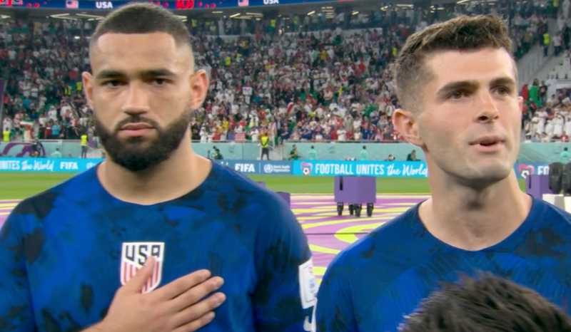 Cameron Carter-Vickers and Christian Pulistic during the US national anthem. 