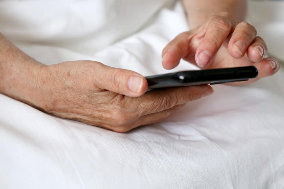 Person using phone porn. (Getty Images)