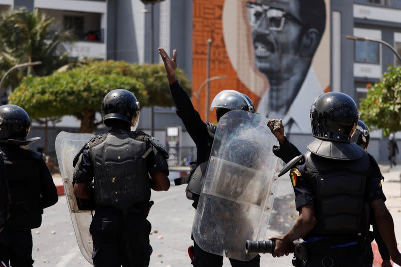 Supporters of opposition leader Ousmane Sonko clash with security forces, in Dakar