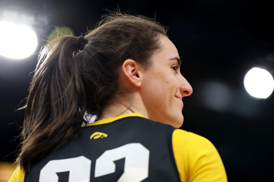 CLEVELAND, OHIO - APRIL 06: Caitlin Clark #22 of the Iowa Hawkeyes looks on during an open practice session ahead of the 2024 NCAA Women's Basketball Final Four National Championship at Rocket Mortgage Fieldhouse on April 06, 2024 in Cleveland, Ohio. (Photo by Steph Chambers/Getty Images)