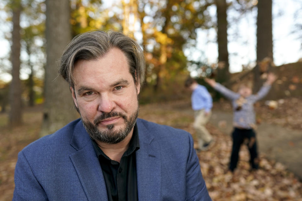 Christopher Hughey poses for a picture with his sons, Henry, 5, Harrison, 9, on Saturday, Nov. 21, 2020, in Charlotte, N.C. Food experts say Americans nervous about making their first Thanksgiving meals can follow a few basic tips to avoid disaster. (AP Photo/Chris Carlson)