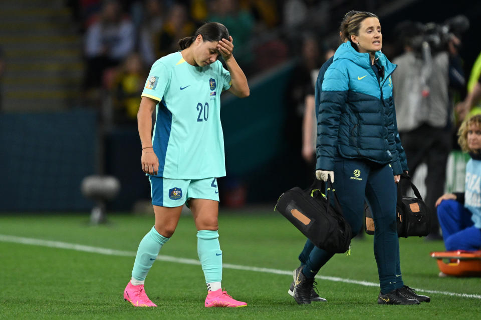 BRISBANE, AUSTRALIA - AUGUST 19: Sam Kerr of Australia leaves the pitch after sustaining an injury during the FIFA Women's World Cup Australia & New Zealand 2023 Third Place Match match between Sweden and Australia at Brisbane Stadium on August 19, 2023 in Brisbane / Meaanjin, Australia. (Photo by Bradley Kanaris/Getty Images)