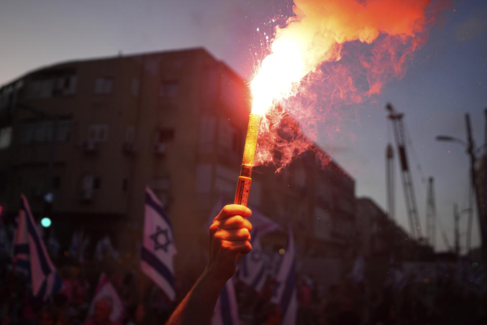 Israelis protest against plans by Prime Minister Benjamin Netanyahu's government to overhaul the judicial system in Tel Aviv, Saturday, June 3, 2023. (AP Photo/Ariel Schalit)