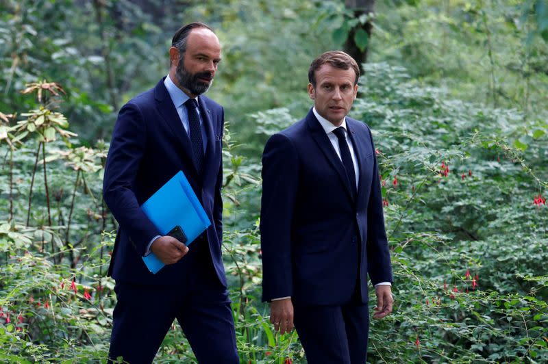 FILE PHOTO: French President Emmanuel Macron meets French citizens' council over environment proposals in Paris