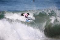 <p>A dog rides a wave during the Surf City Surf Dog competition in Huntington Beach, California, U.S., September 25, 2016. REUTERS/Lucy Nicholson</p>