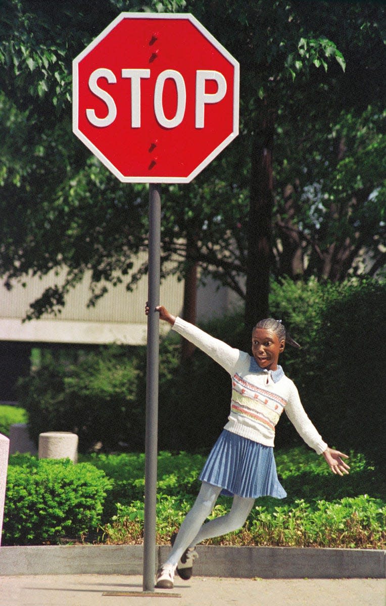 The "Waiting to Cross” sculpture by J. Seward Johnson has been purchased by Carmel.