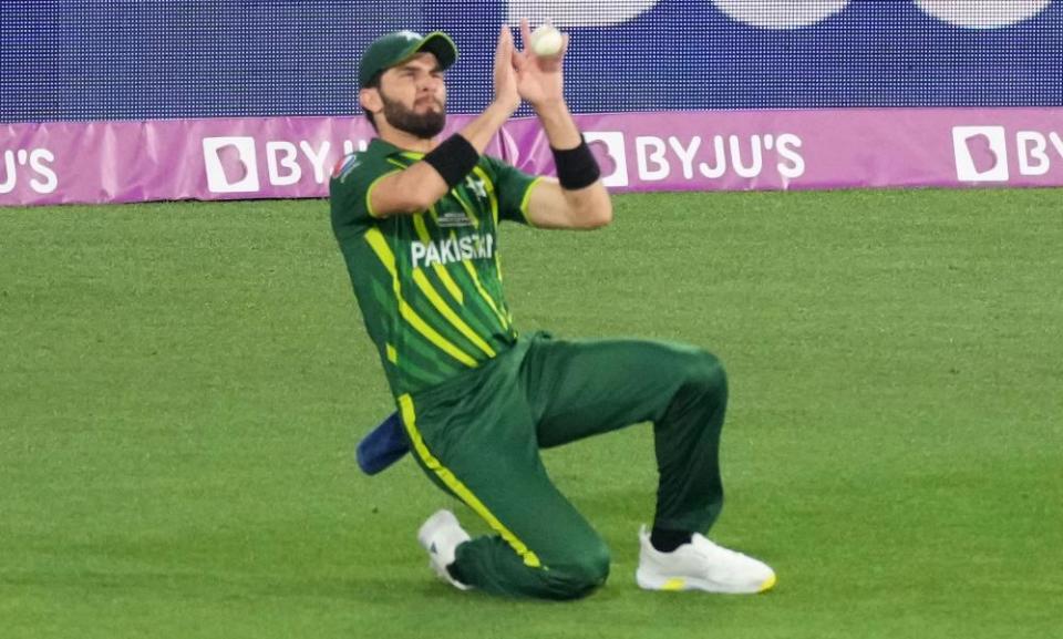 Shaheen Afridi takes a catch to dismiss England’s Harry Brook but the Pakistan bowler hurt himself in the process